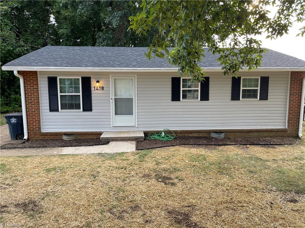 Front of Property with New Windows and Vinyl Siding