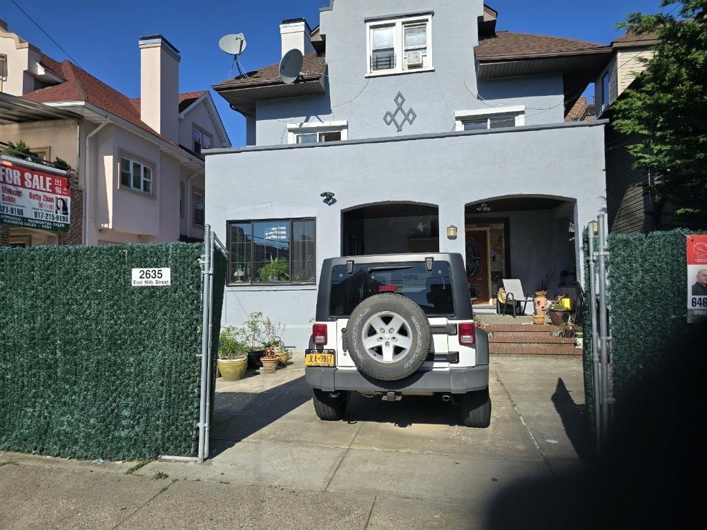 a car parked in front of a building