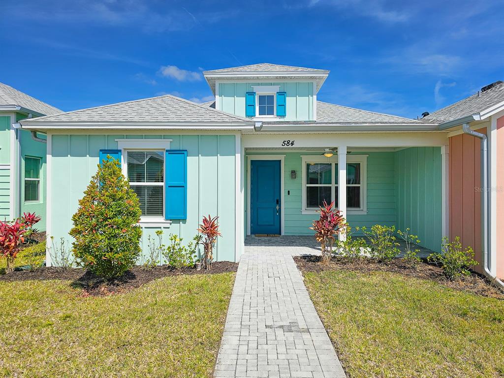 a front view of a house with a porch