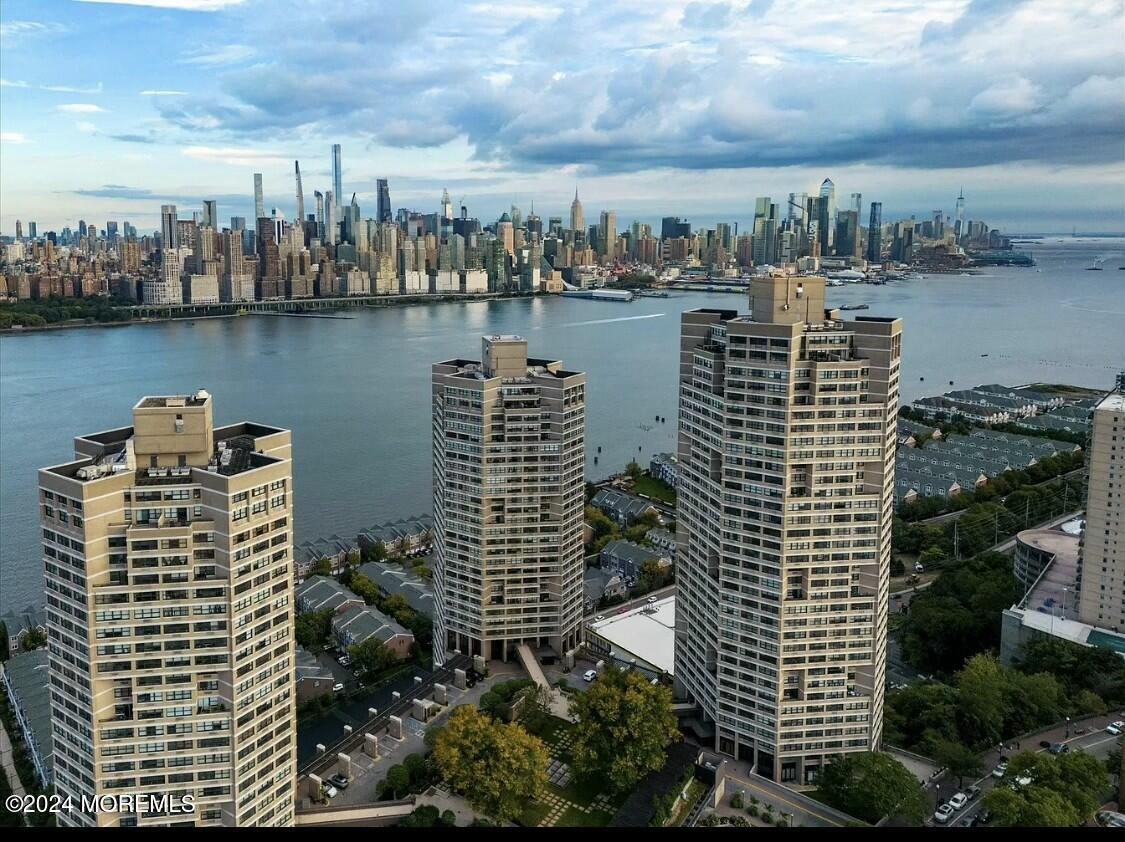 a view of a city with tall buildings