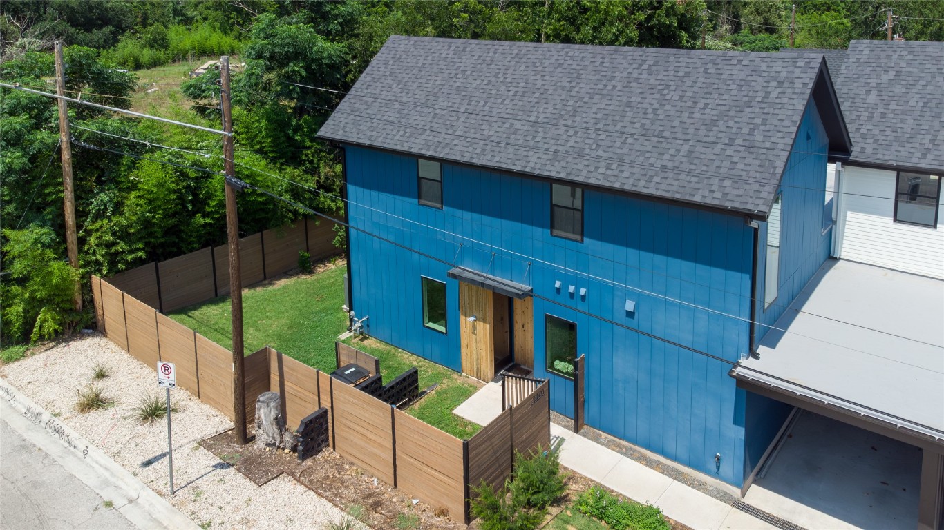 Well-maintained landscaping, classic porch, and neat driveway create a warm welcome