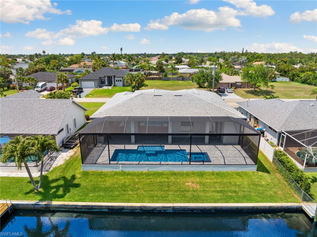 a view of a swimming pool with a patio