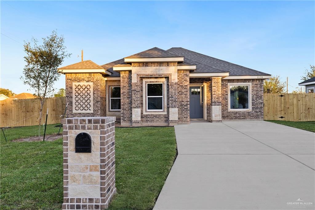 View of front of home with a front lawn