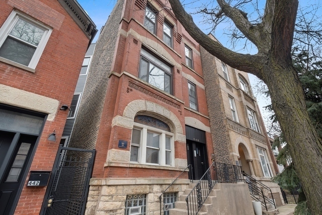 a front view of a multi story residential apartment building