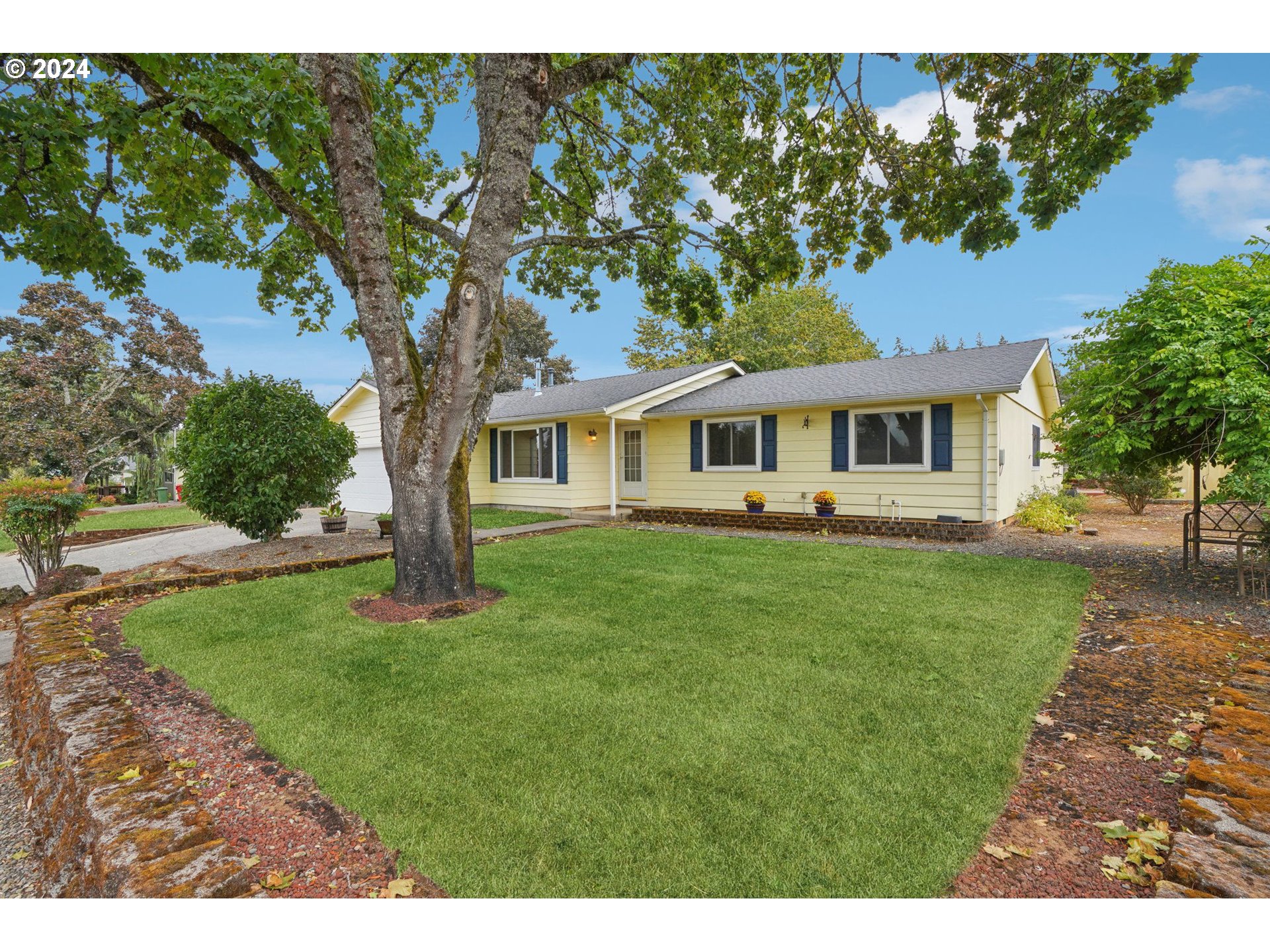 a house view with a garden space