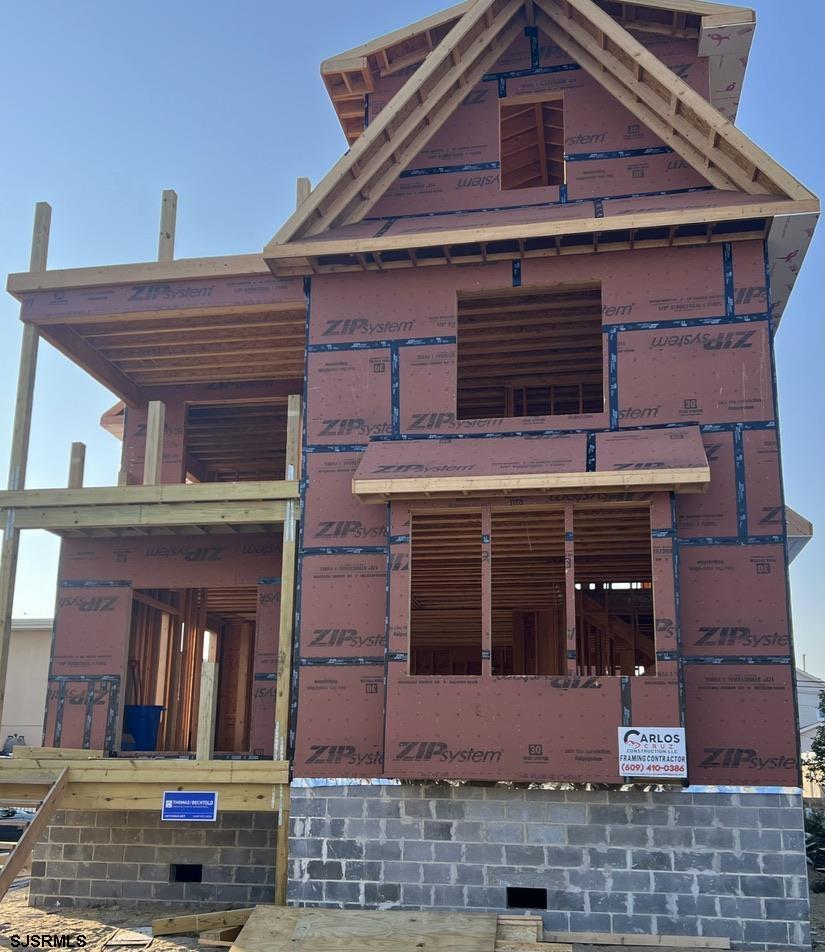 a front view of a house with parking