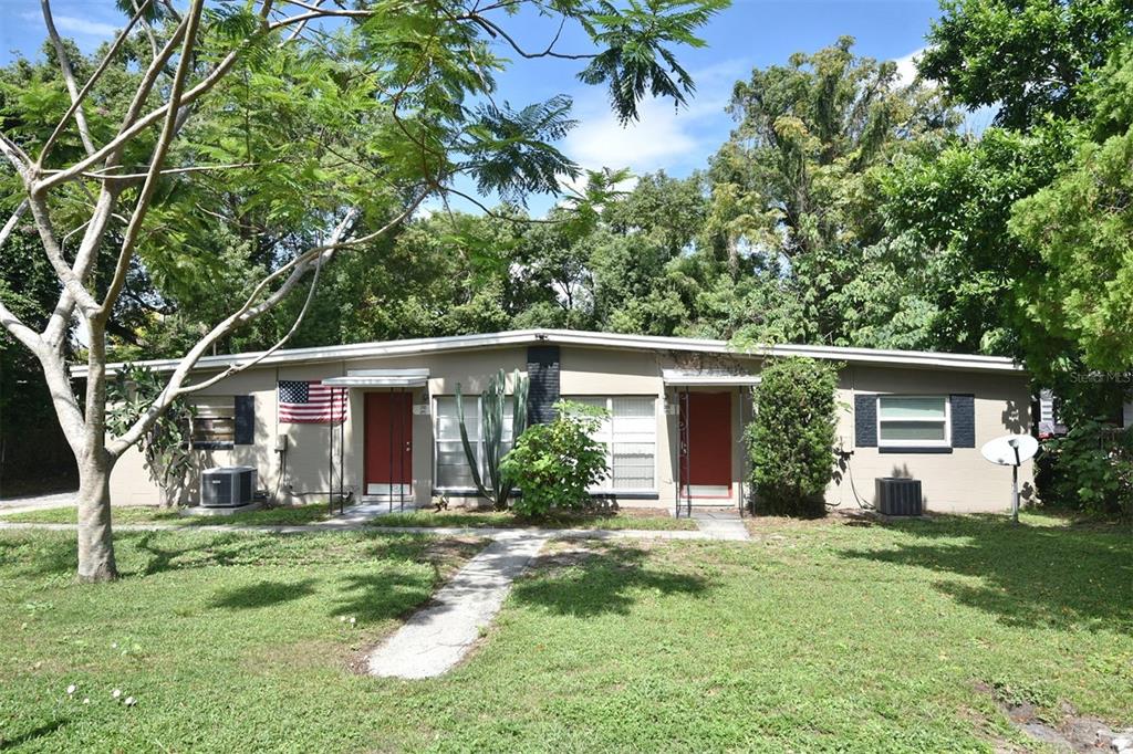 front view of a house with a yard