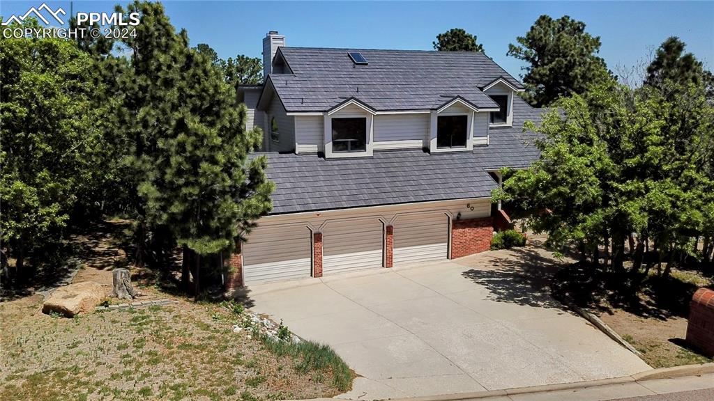 View of front of house with a garage