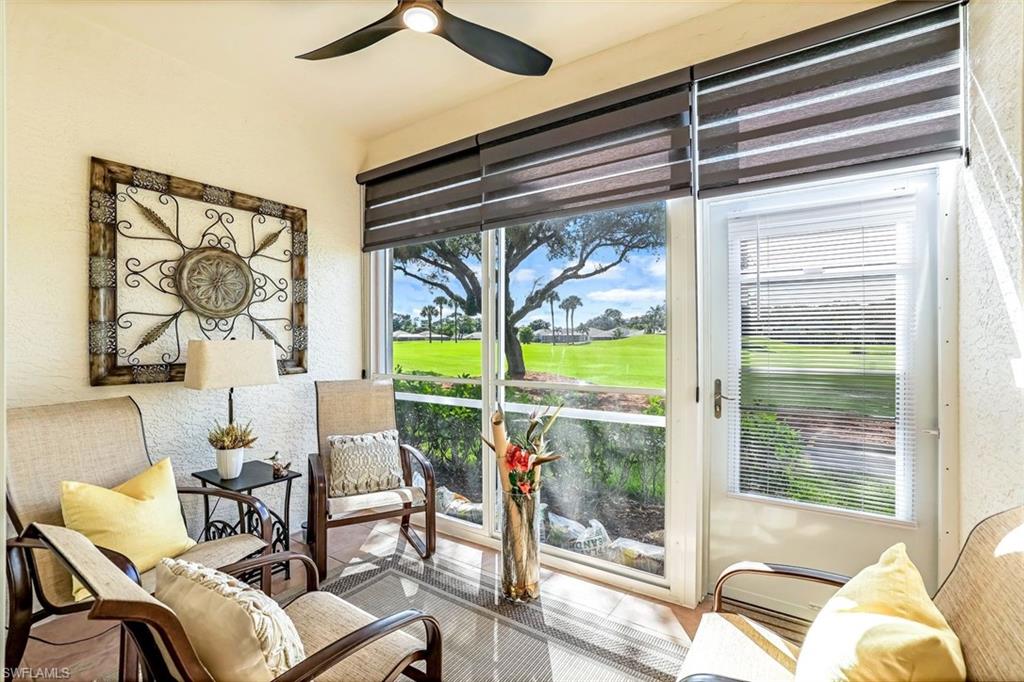 a view of a livingroom with furniture and a porch