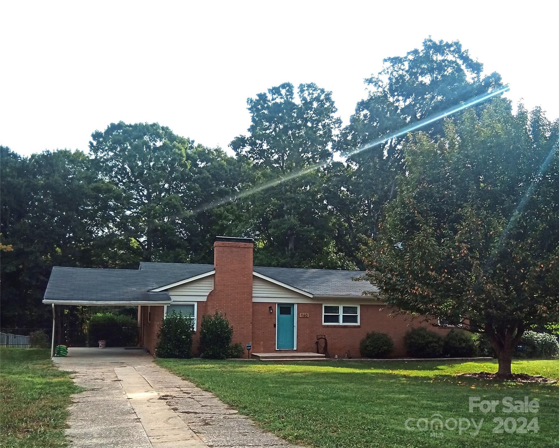 front view of house with a yard