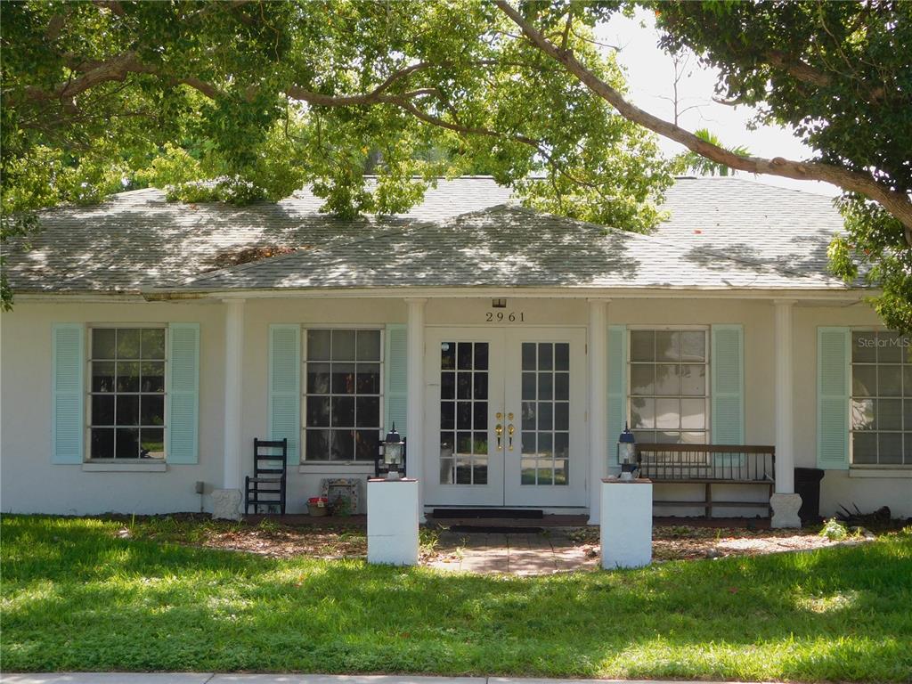 front view of a house with a yard