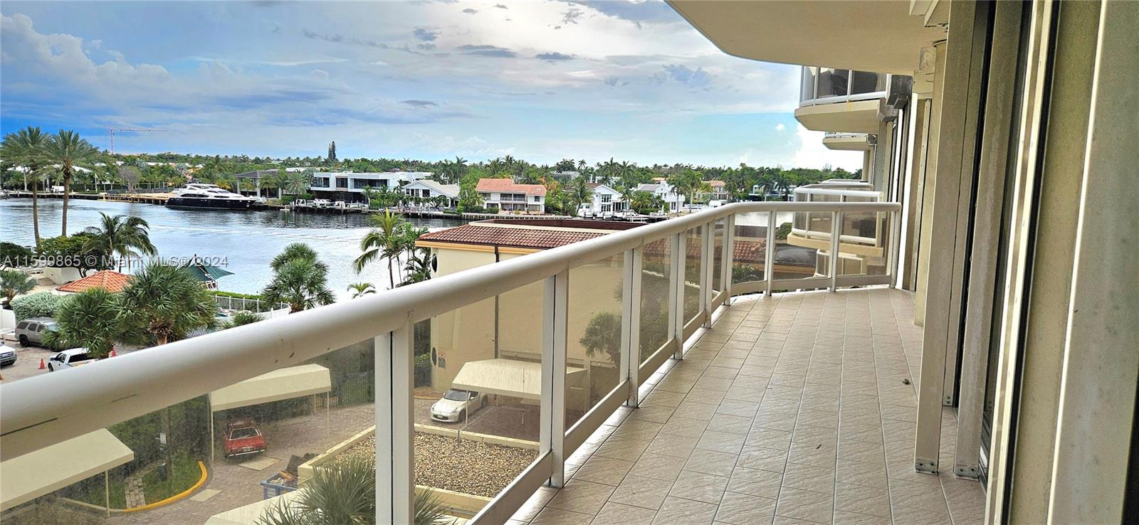 a view of swimming pool from a balcony