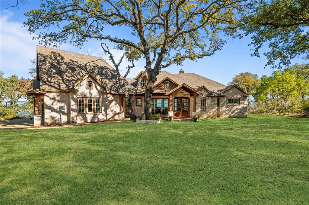 a view of a house with a big yard