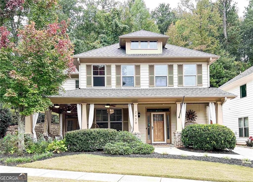 front view of a house with a yard