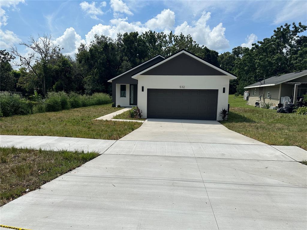 a front view of house with yard