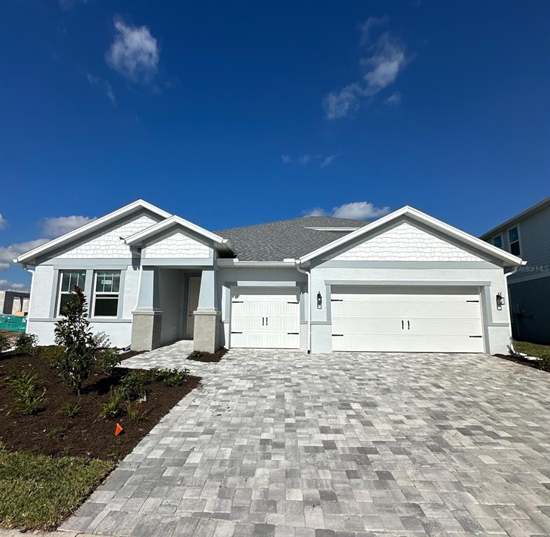 a front view of a house with yard