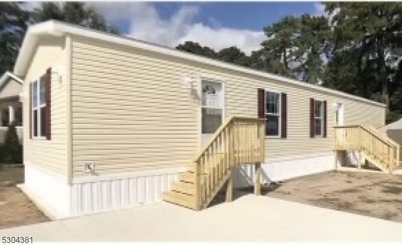 a view of a house with a patio