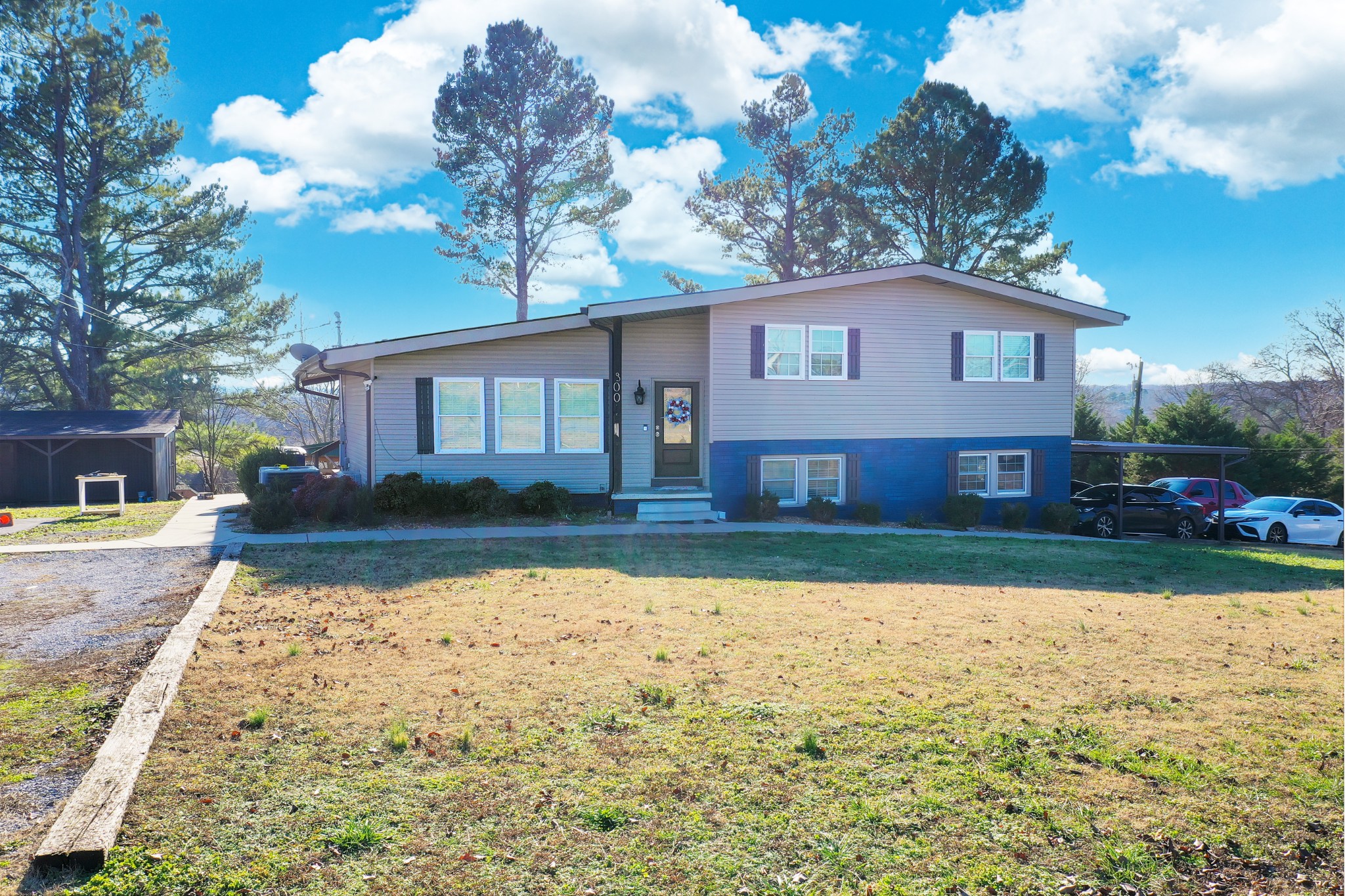 a view of a yard in front of a house