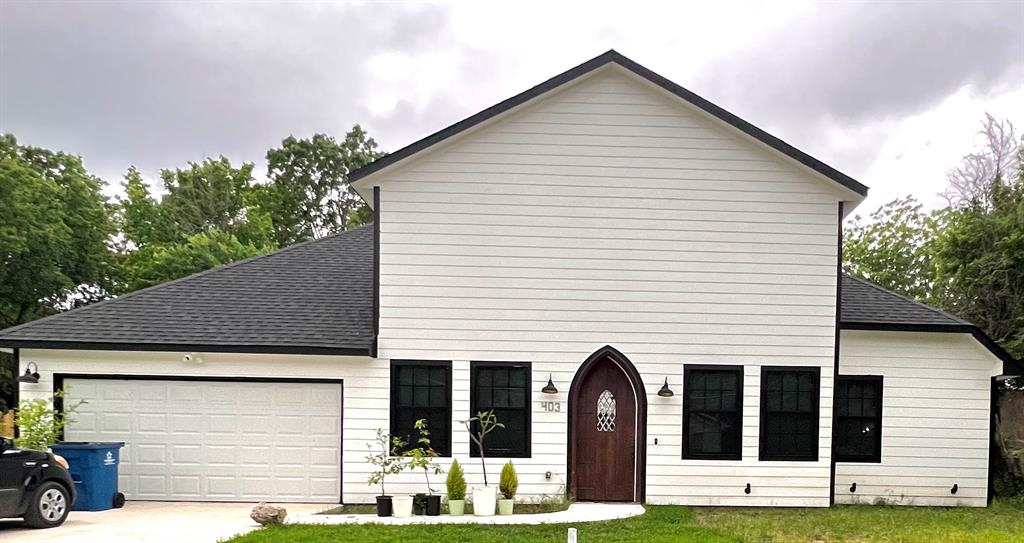 a front view of house with yard