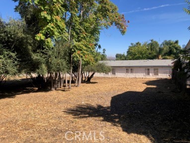 a view of house with outdoor space