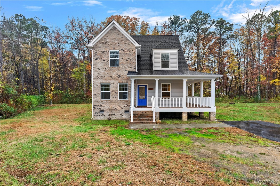 front view of a house with a yard