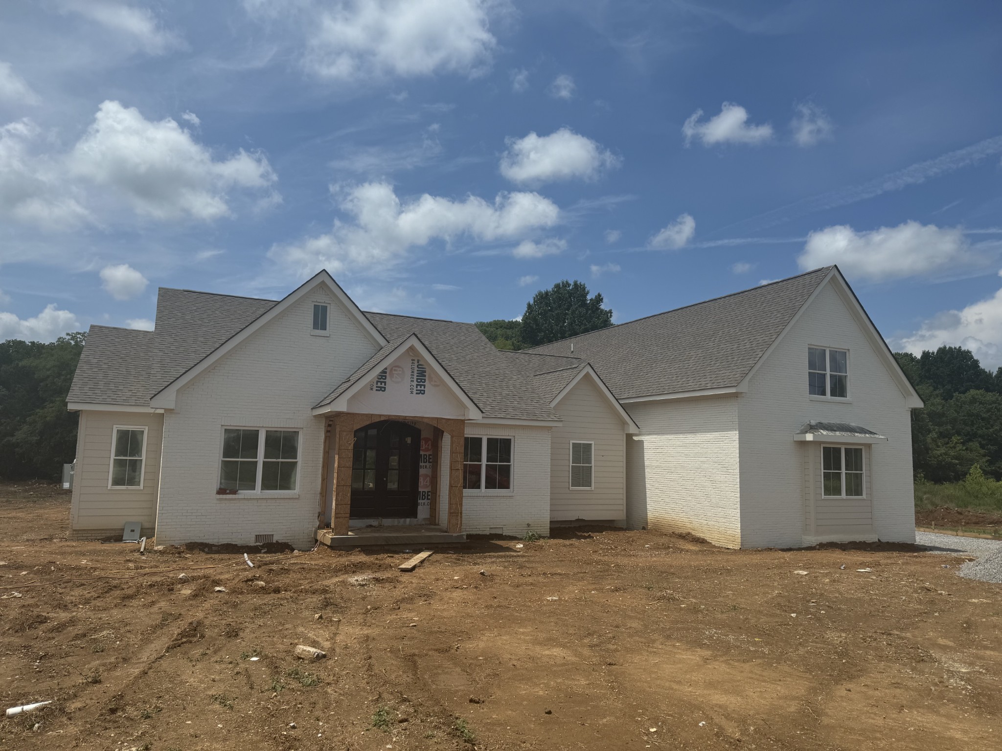 front view of a house with a dry yard