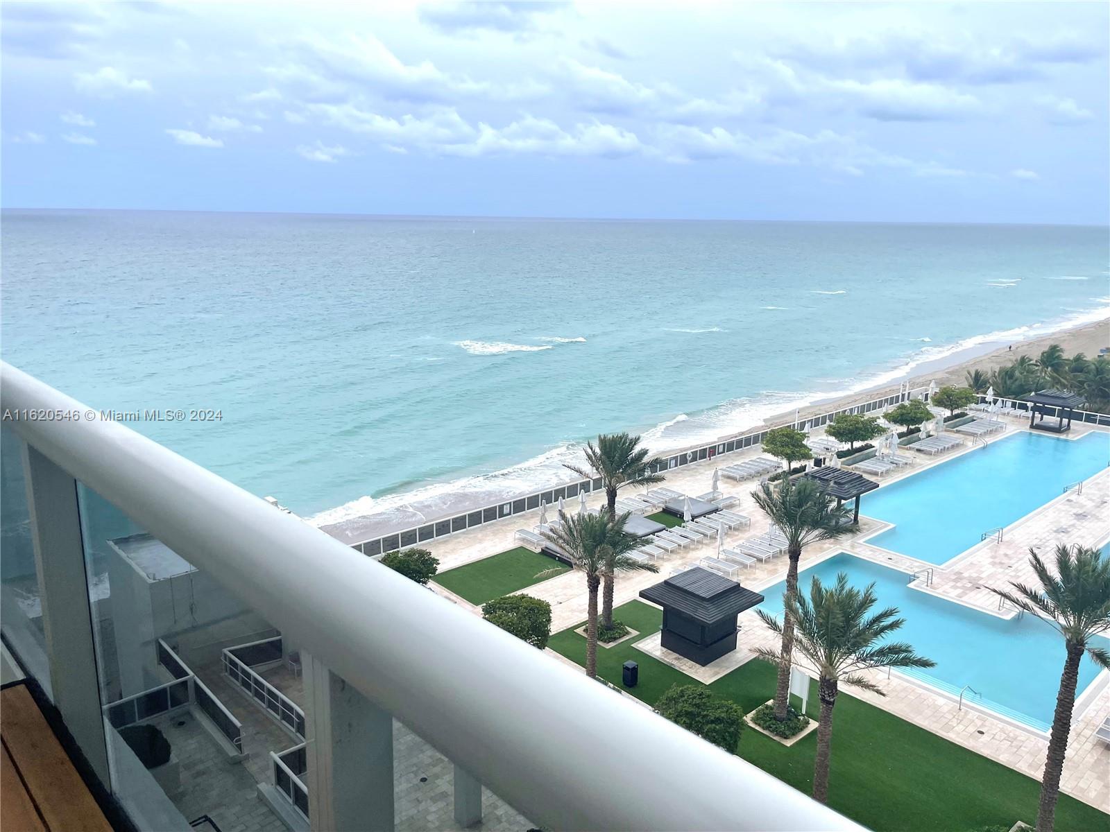 a view of swimming pool with ocean view