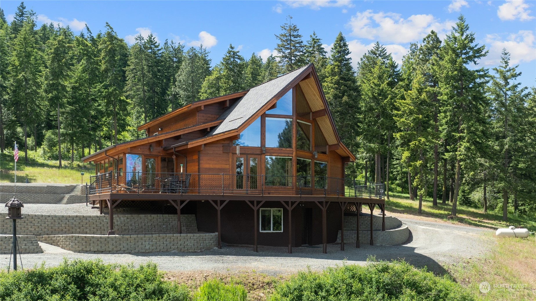 a view of house with outdoor space and swimming pool