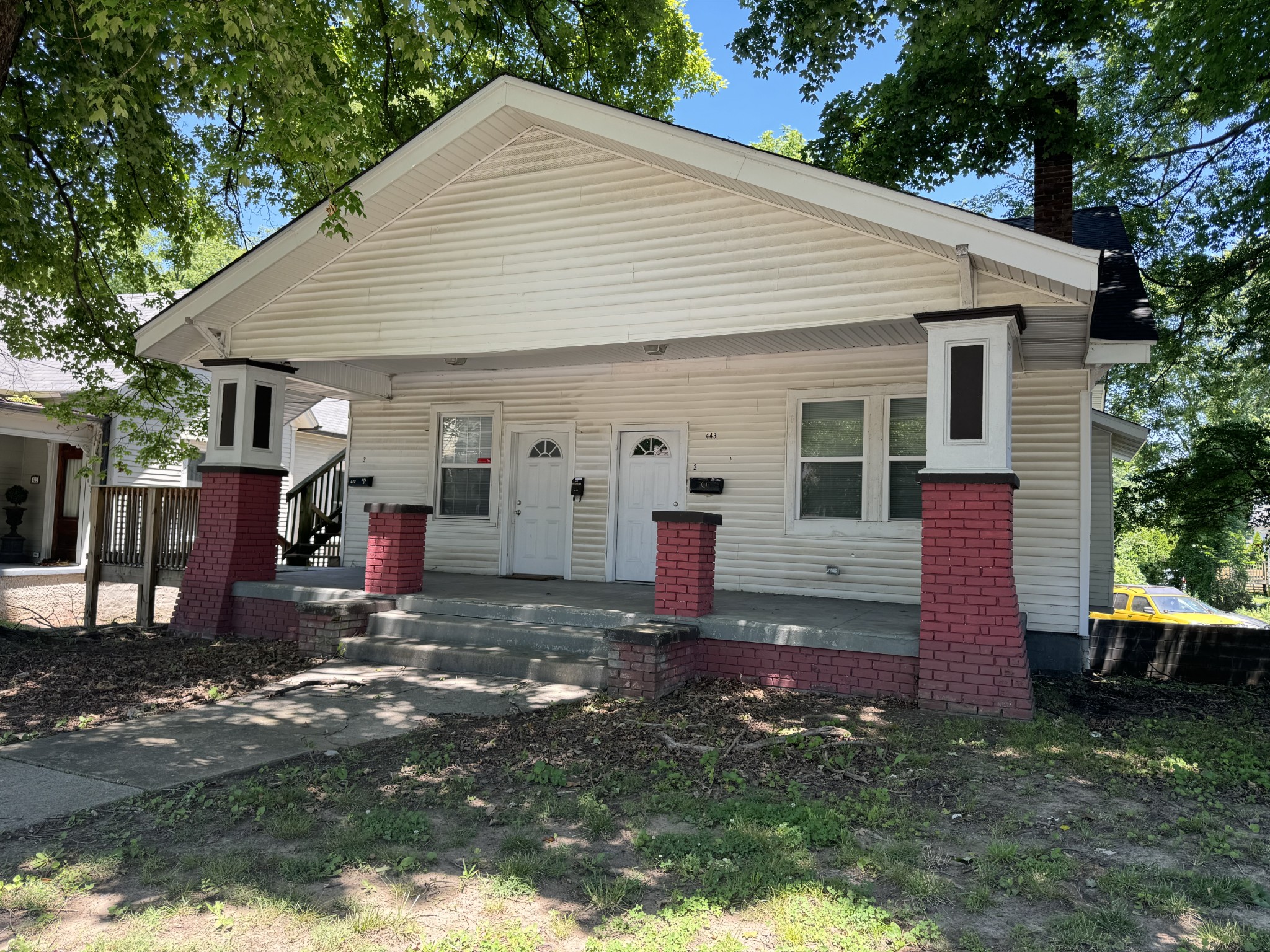 a front view of house with yard