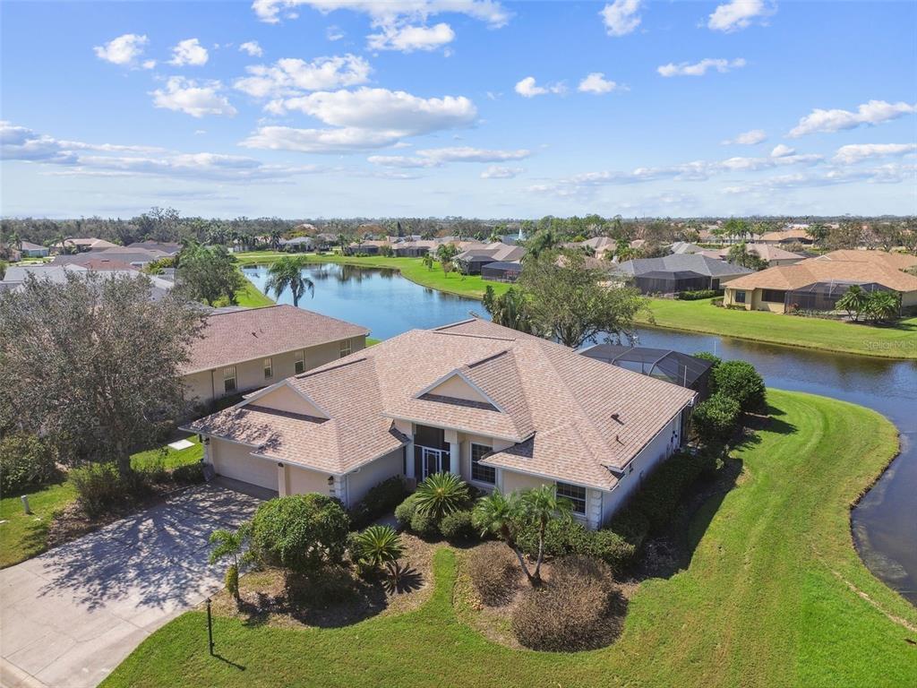 an aerial view of a house with a garden