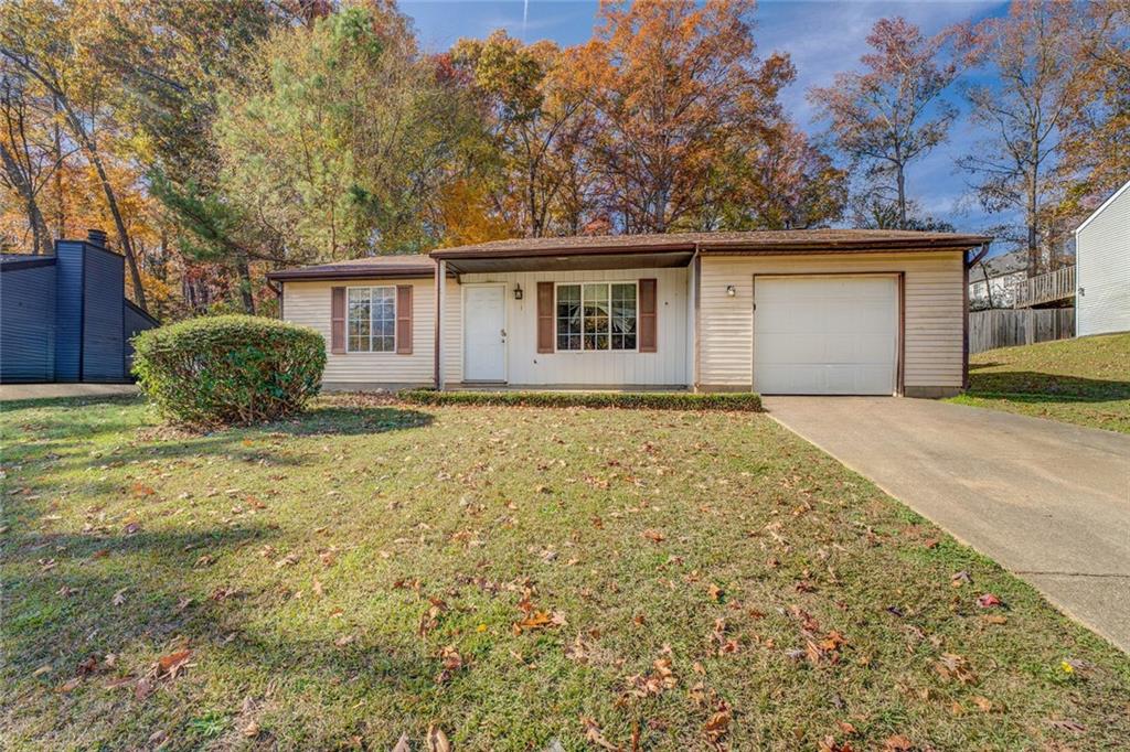 front view of a house with a yard