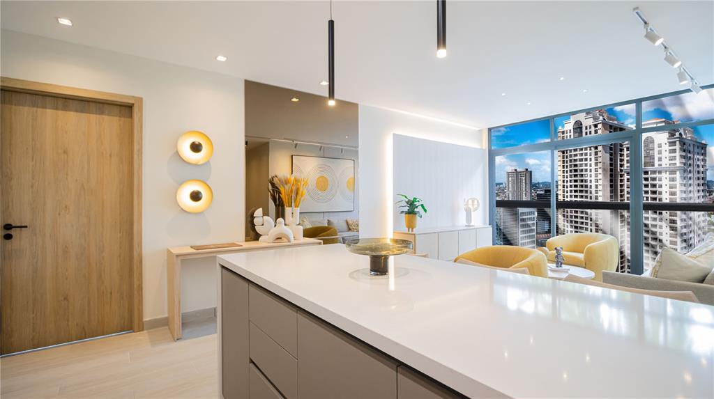 a kitchen with stainless steel appliances kitchen island granite countertop a sink and cabinets