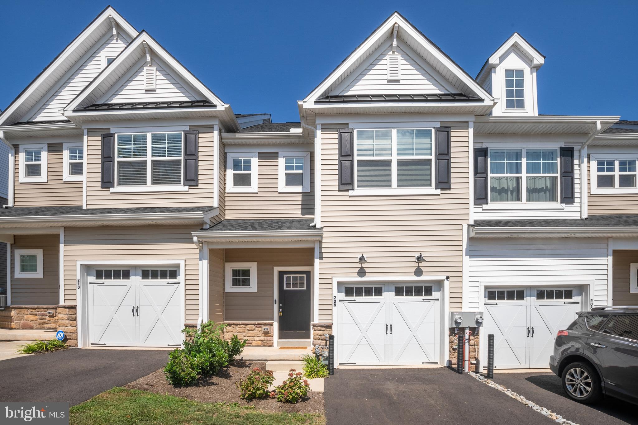 a view of multiple houses with a yard