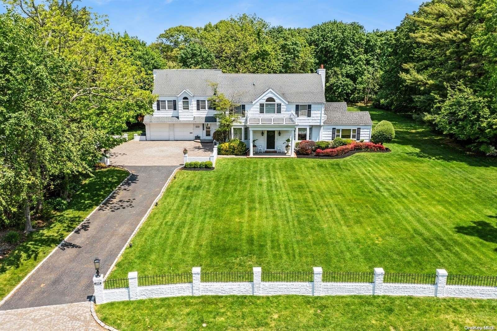 a aerial view of a house with a garden