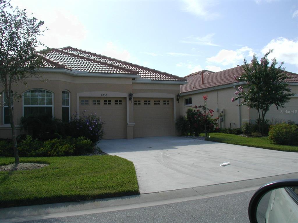 a house view with a garden space