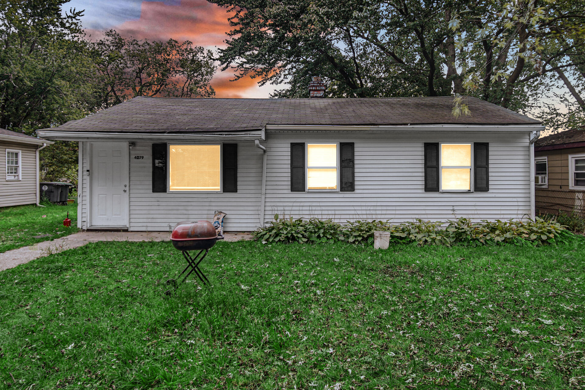 a front view of a house with yard