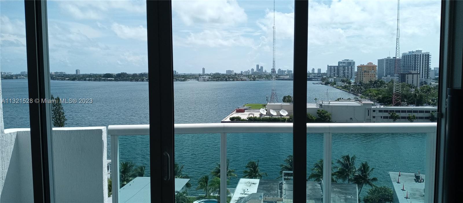 a view of a lake from a balcony