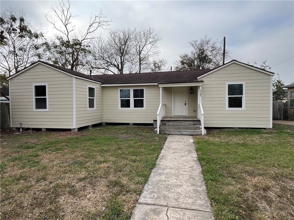 a front view of house with yard