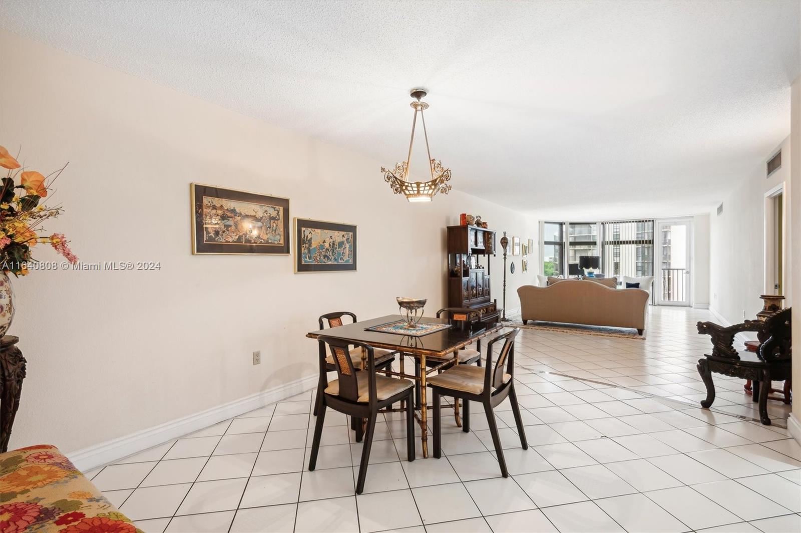 a view of a livingroom with furniture and dining room