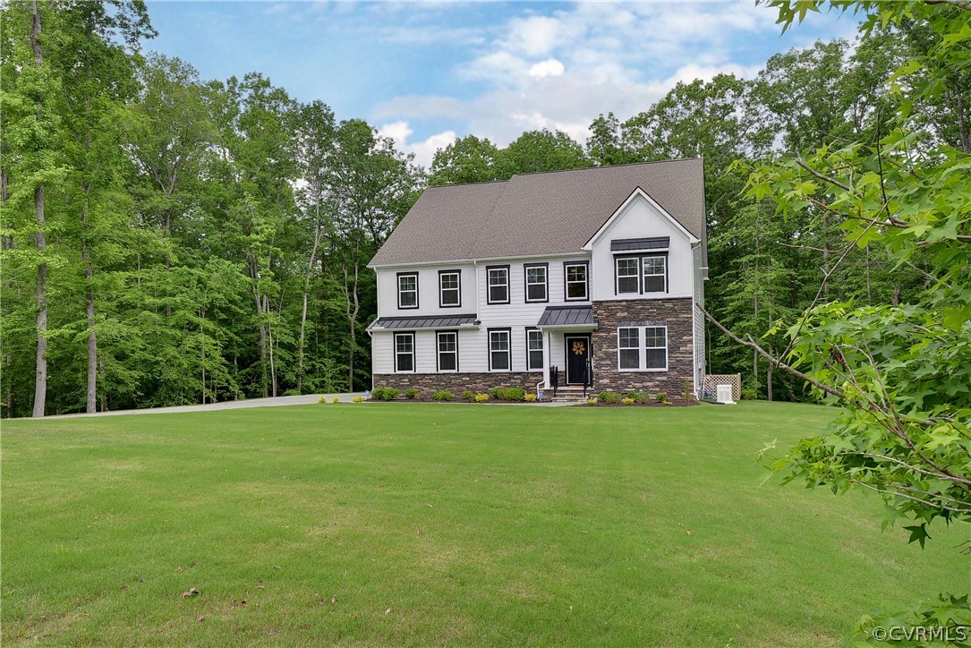 a view of a house with a big yard