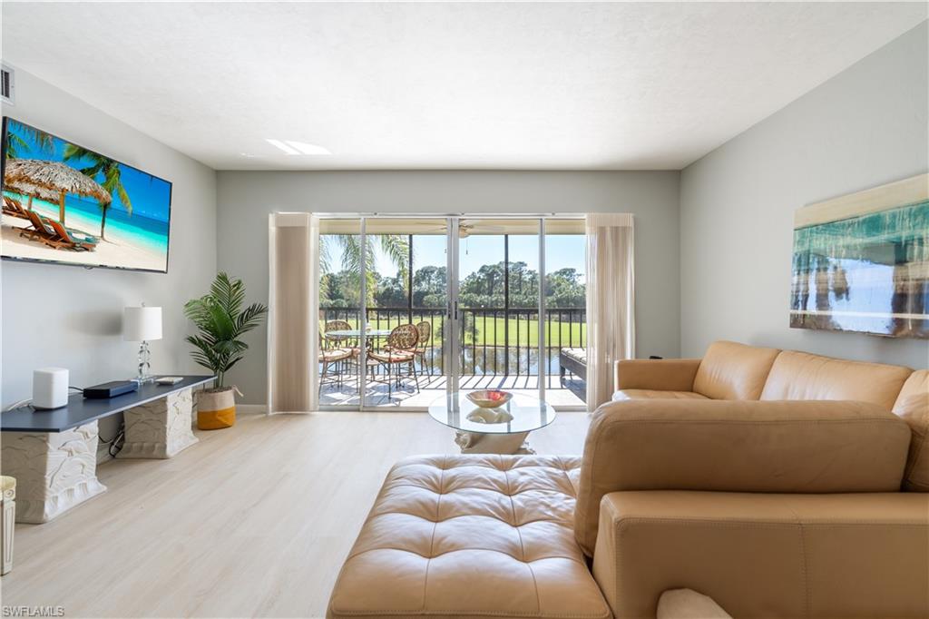 Living room featuring luxury vinyl flooring