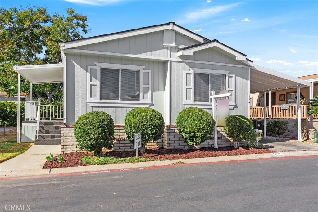 front view of a house with a small yard