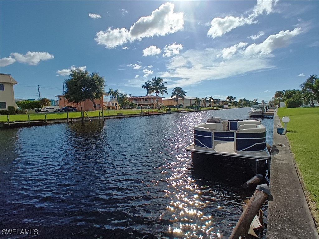 a view of a lake with a house