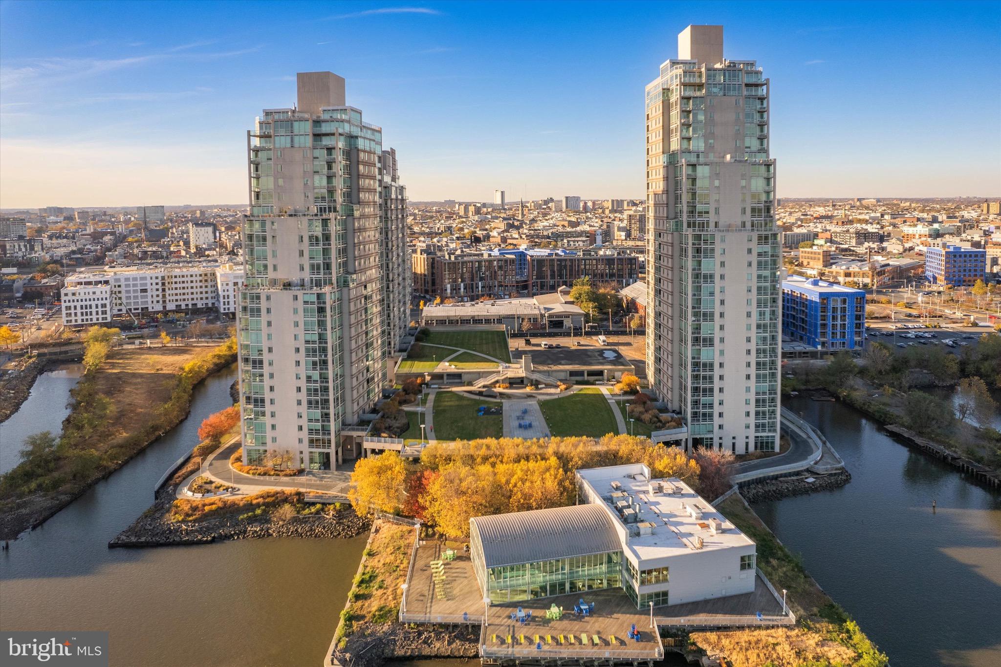 a view of a city with tall buildings