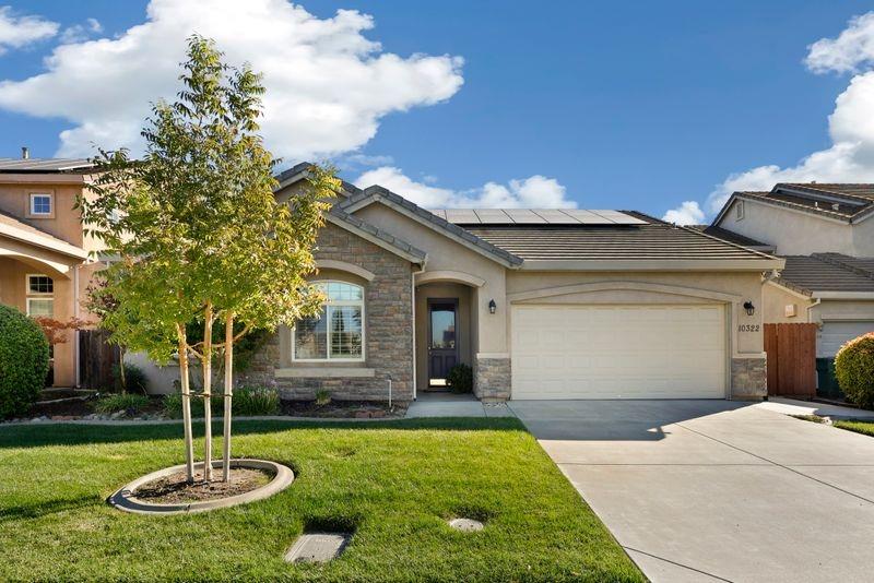 a house view with a garden space