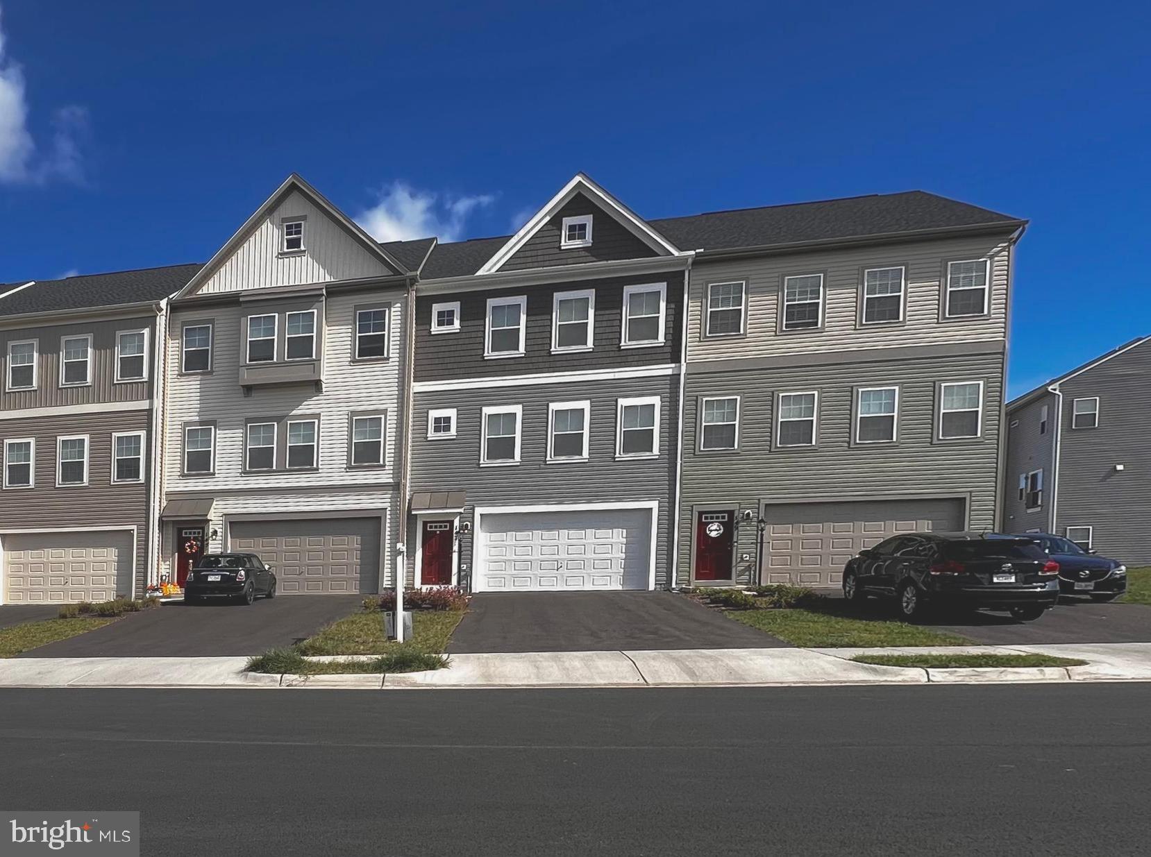 a front view of residential houses