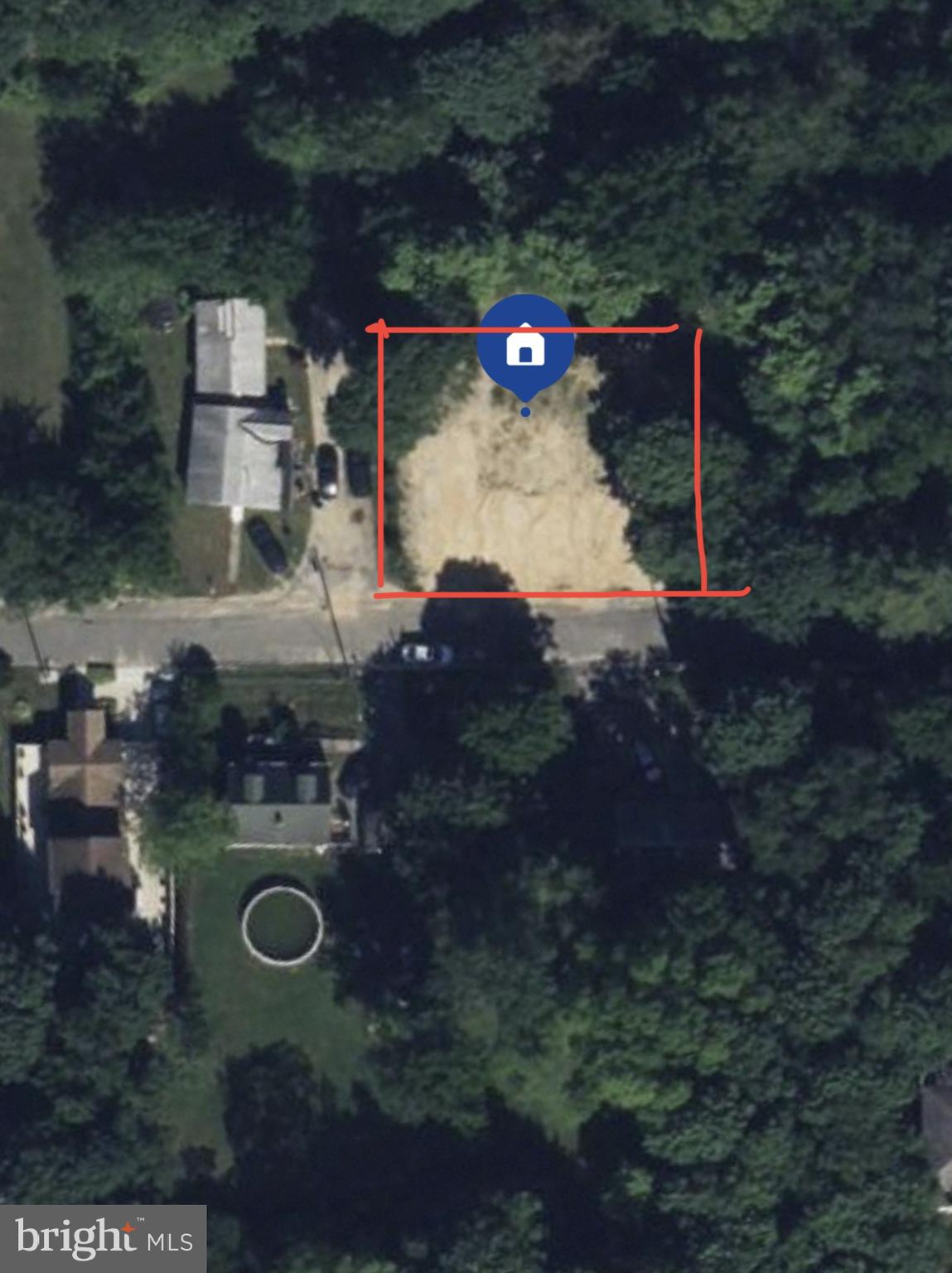 a aerial view of a house with yard