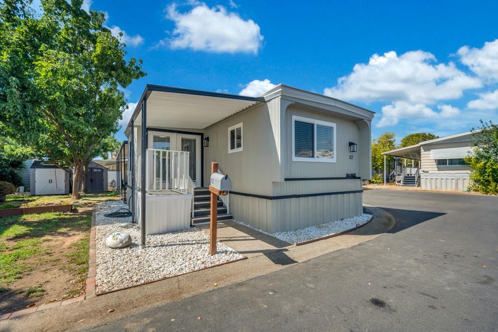 a front view of a house with a garage