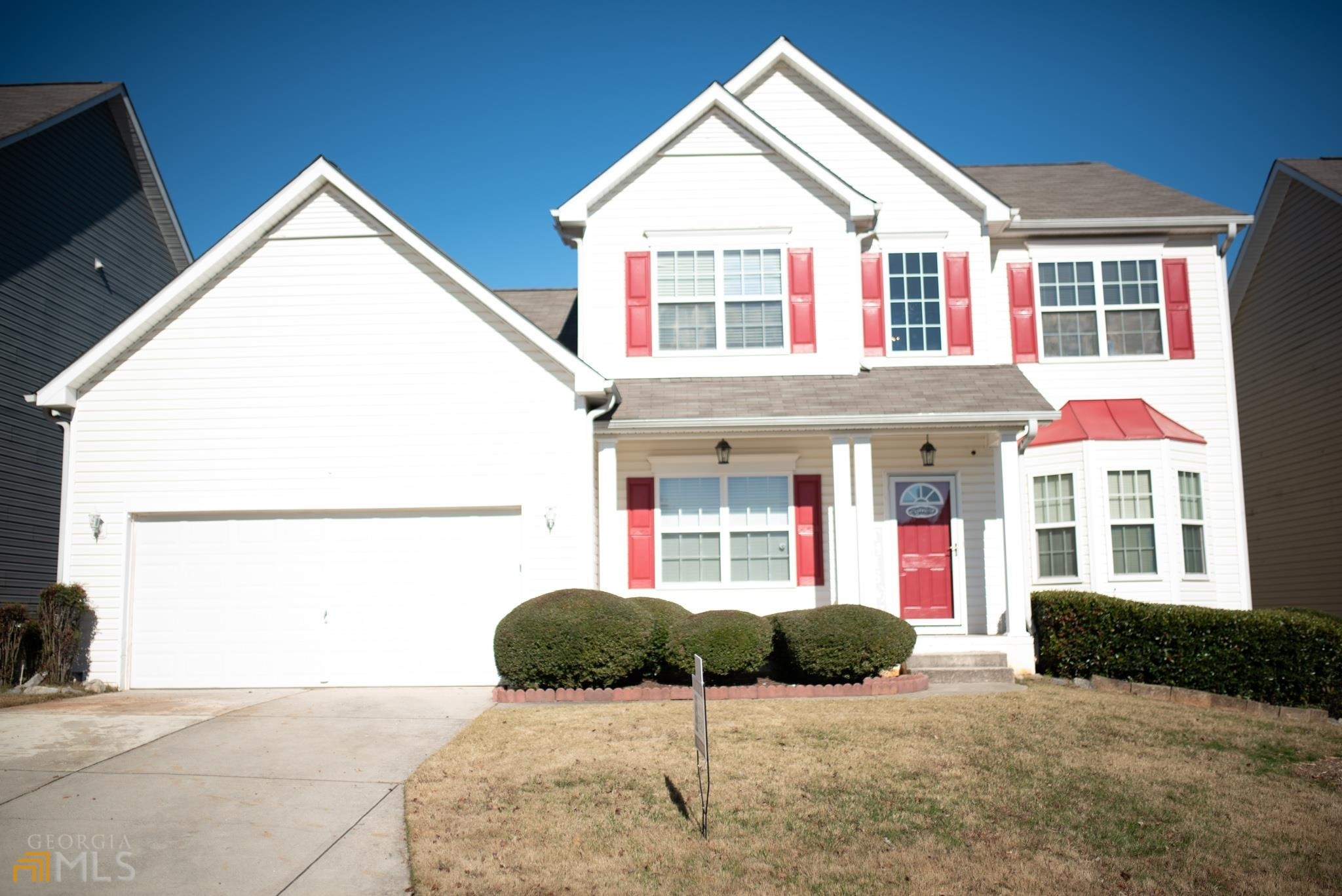 a view of outdoor space and front view of a house