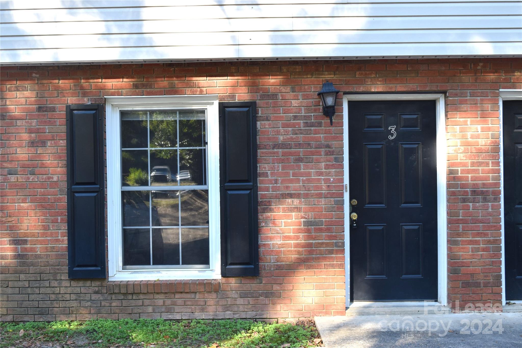 a view of entrance front of a house